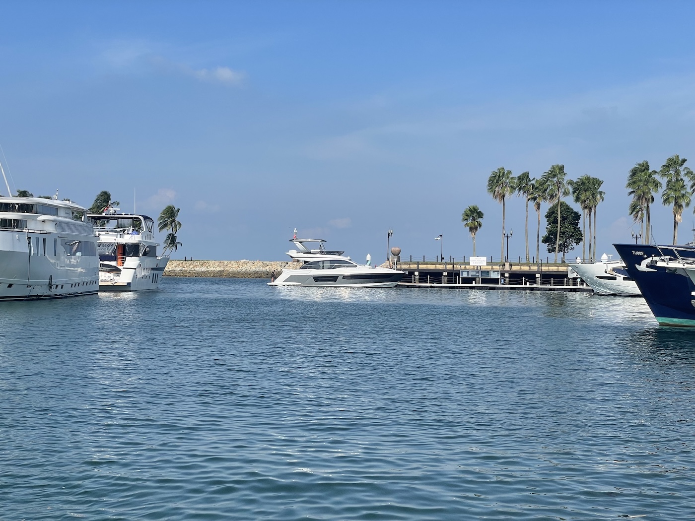 Sunseeker yacht docking at CIQP immigration ONE15 marina Singapore